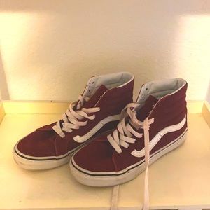 Red high top velvety vans. They are used but in good condition.